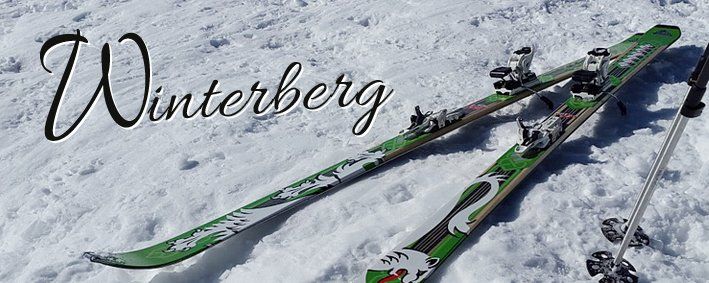 Green skis and poles in the snow with the word